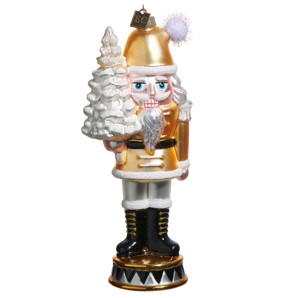 Gold Nutcracker Holding Christmas Tree Glass Ornament 7"