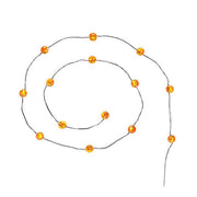 String of Lit Pumpkins