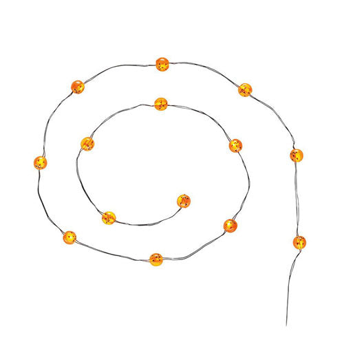 String of Lit Pumpkins