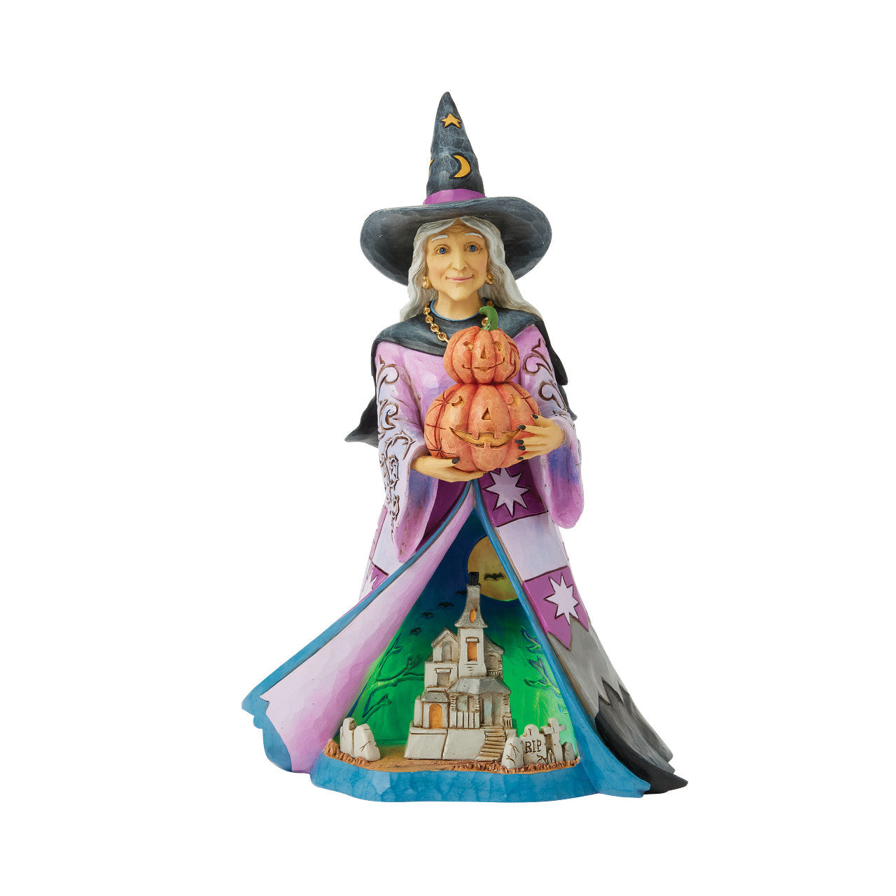 Spellbinding Smiles Kind Witch Holding Pumpkin and Lit Scene