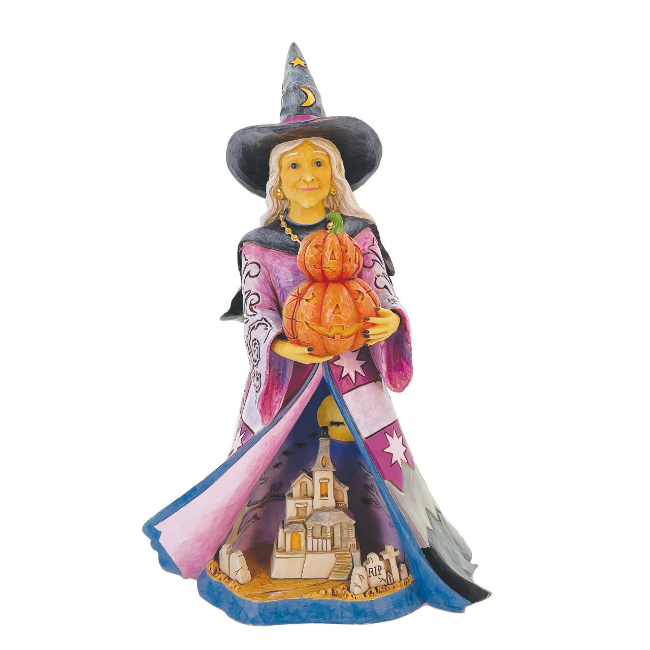 Spellbinding Smiles Kind Witch Holding Pumpkin and Lit Scene