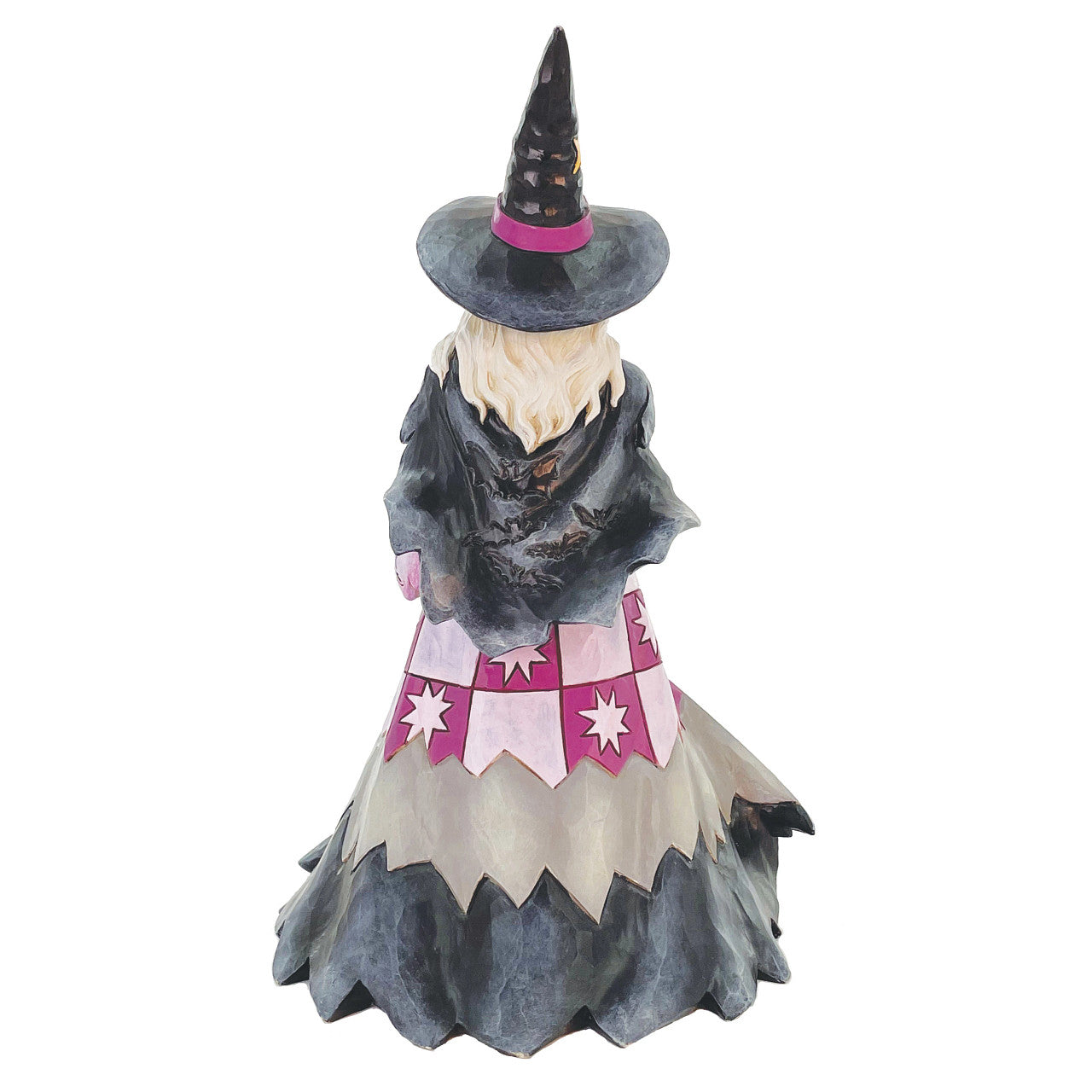 Spellbinding Smiles Kind Witch Holding Pumpkin and Lit Scene