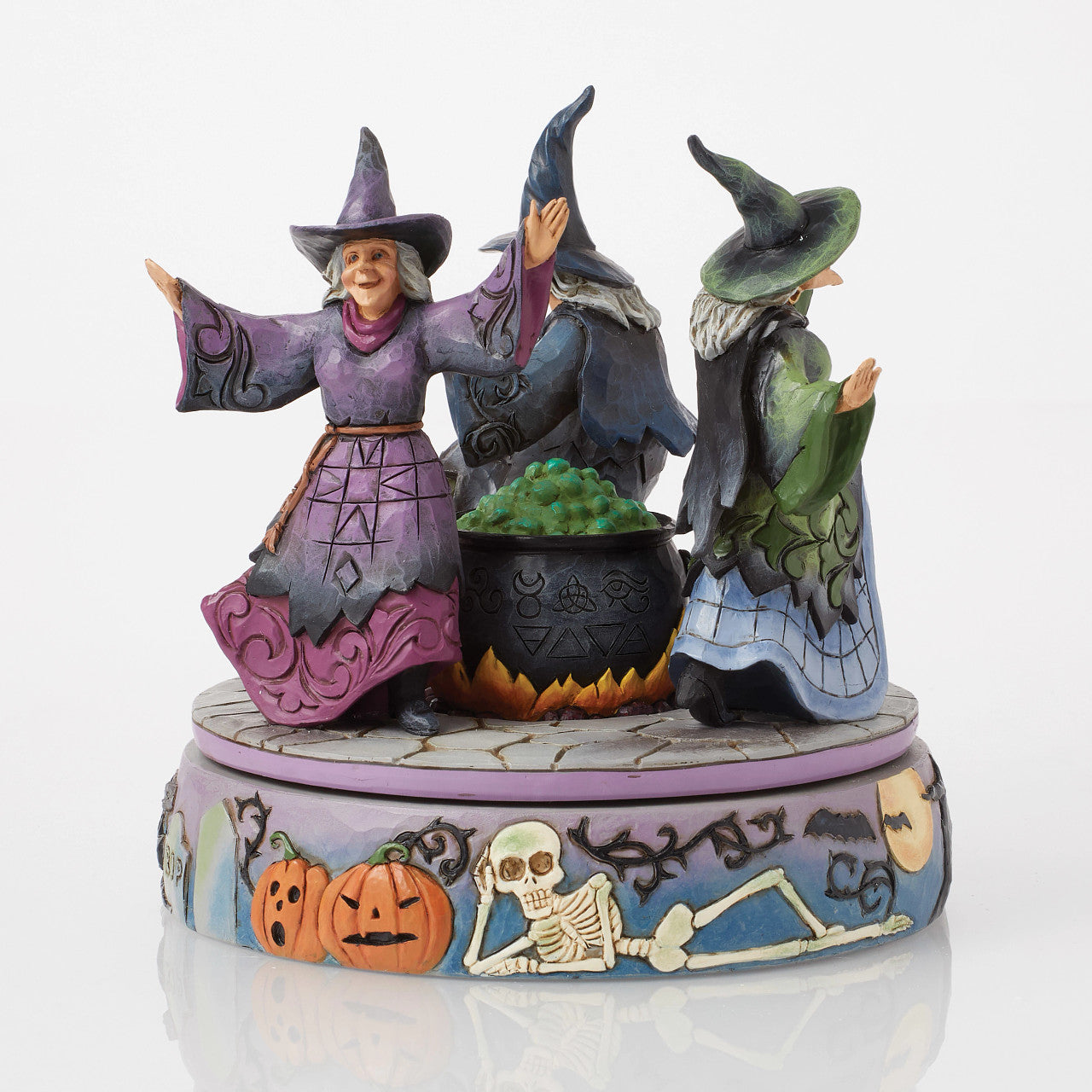 A-Haunting We Will Go Witches Rotating Around the Cauldron