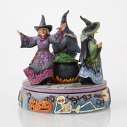 A-Haunting We Will Go Witches Rotating Around the Cauldron