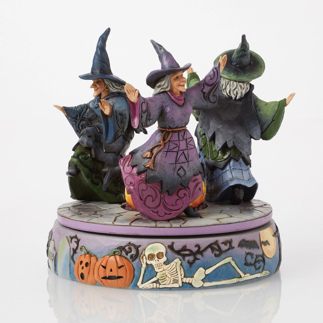 A-Haunting We Will Go Witches Rotating Around the Cauldron