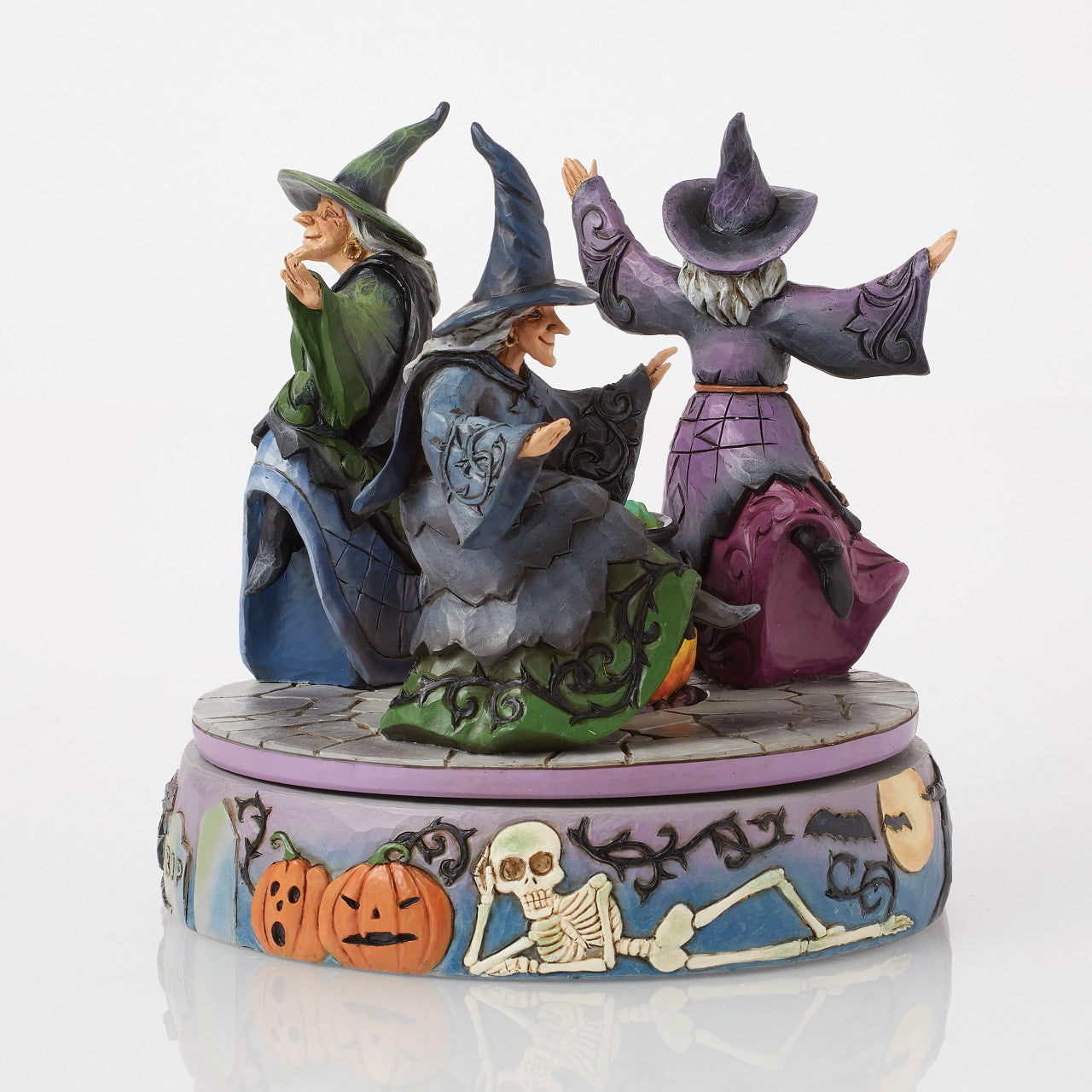 A-Haunting We Will Go Witches Rotating Around the Cauldron