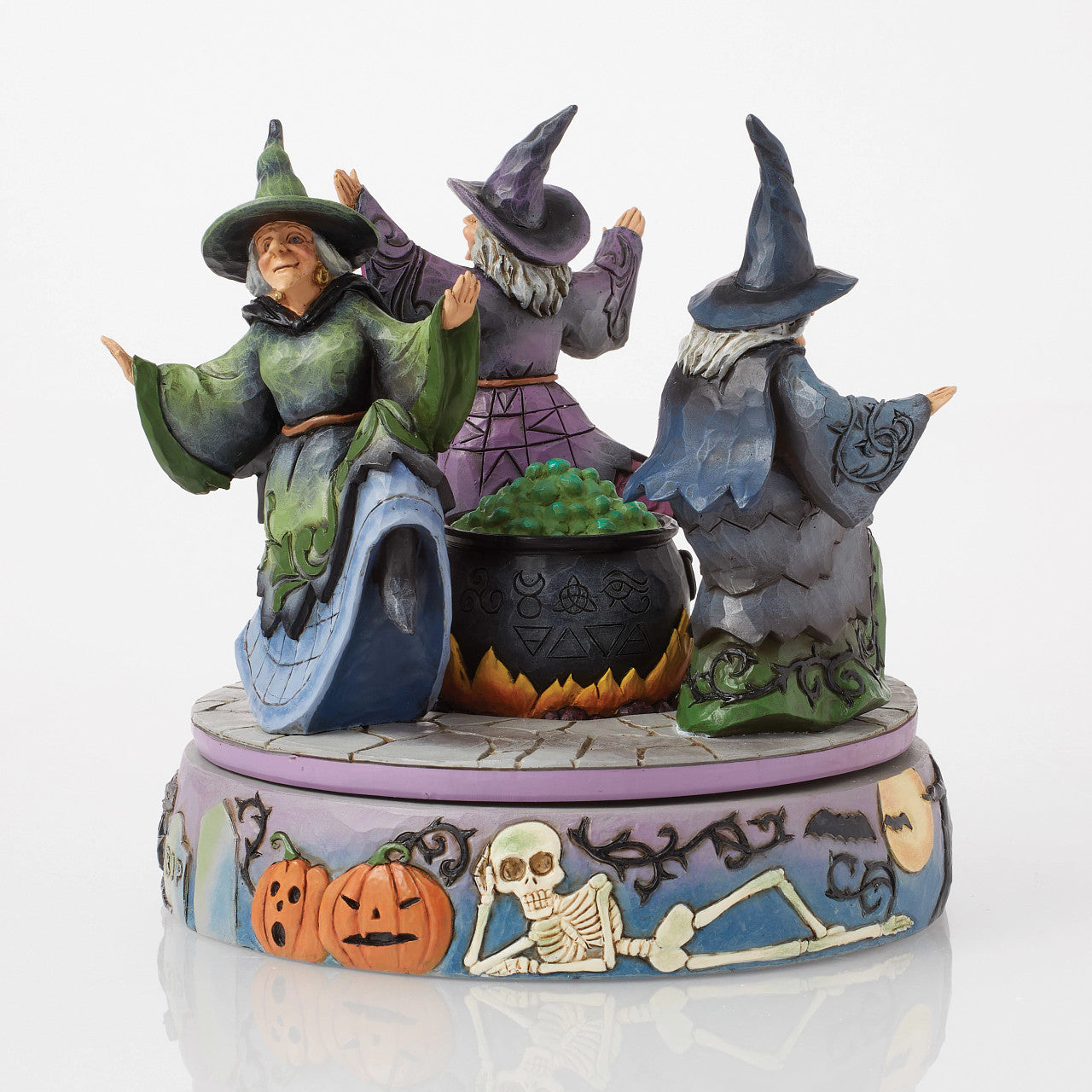 A-Haunting We Will Go Witches Rotating Around the Cauldron
