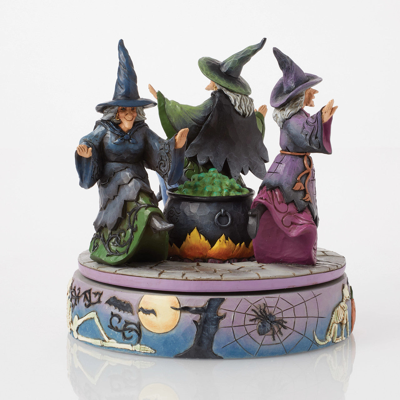 A-Haunting We Will Go Witches Rotating Around the Cauldron
