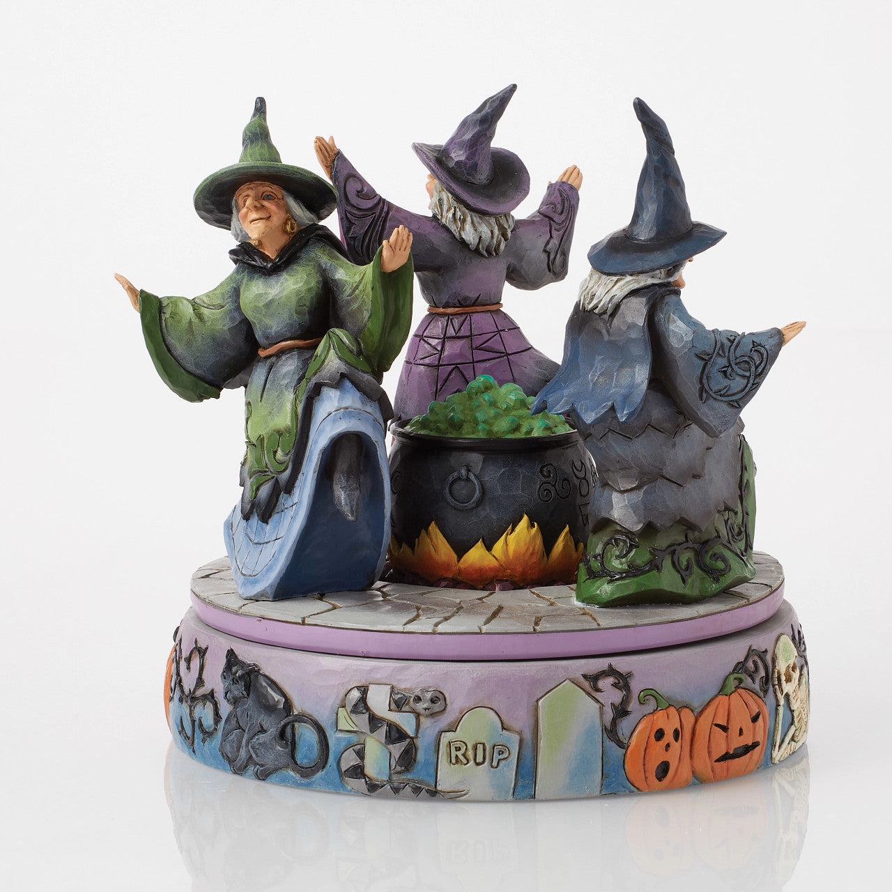 A-Haunting We Will Go Witches Rotating Around the Cauldron