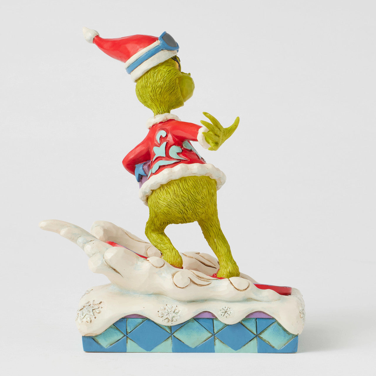 Grinch Snowboarding with Gifts