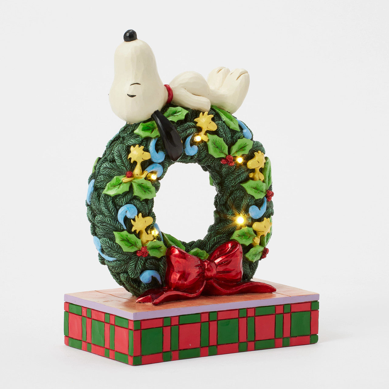 Snoopy Sleeping on LED Wreath of Woodstocks