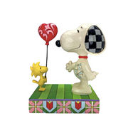 Love Floats Woodstock giving Snoopy a Heart Shaped Balloon