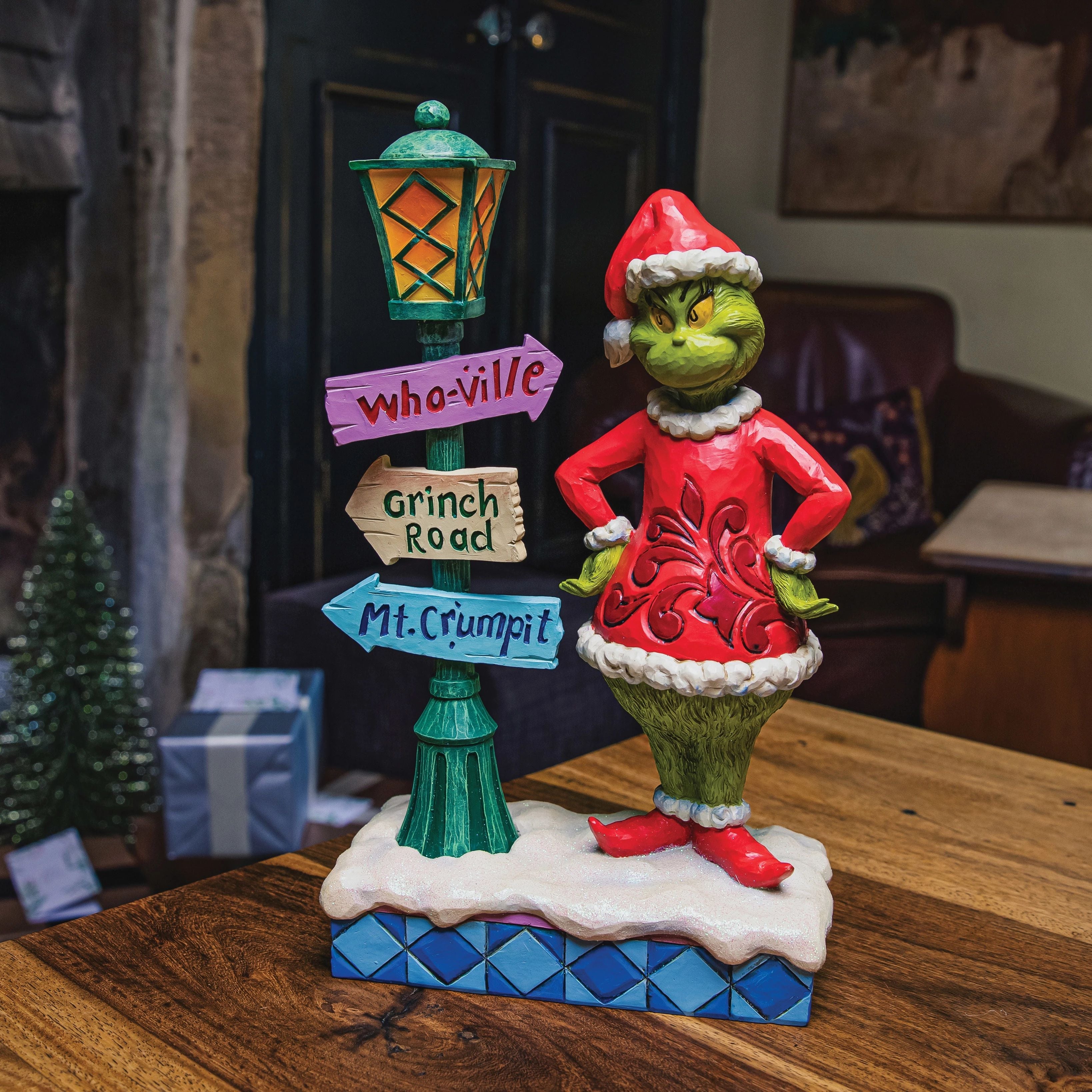 Grinch by Lit Lamppost with Street Signs