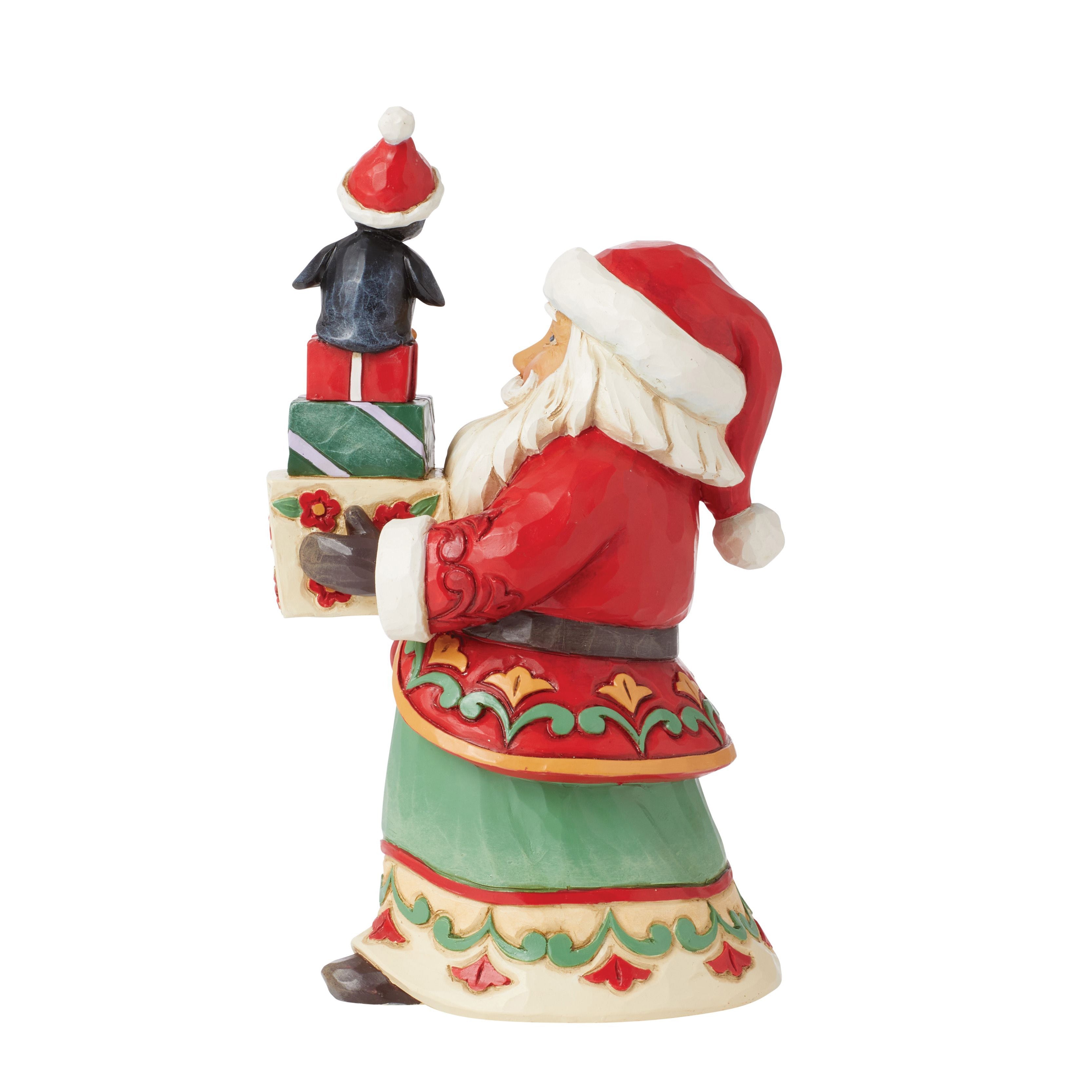 Loaded Up With Christmas Cheer Pint Sized Santa With Stock of Presents and a Penguin