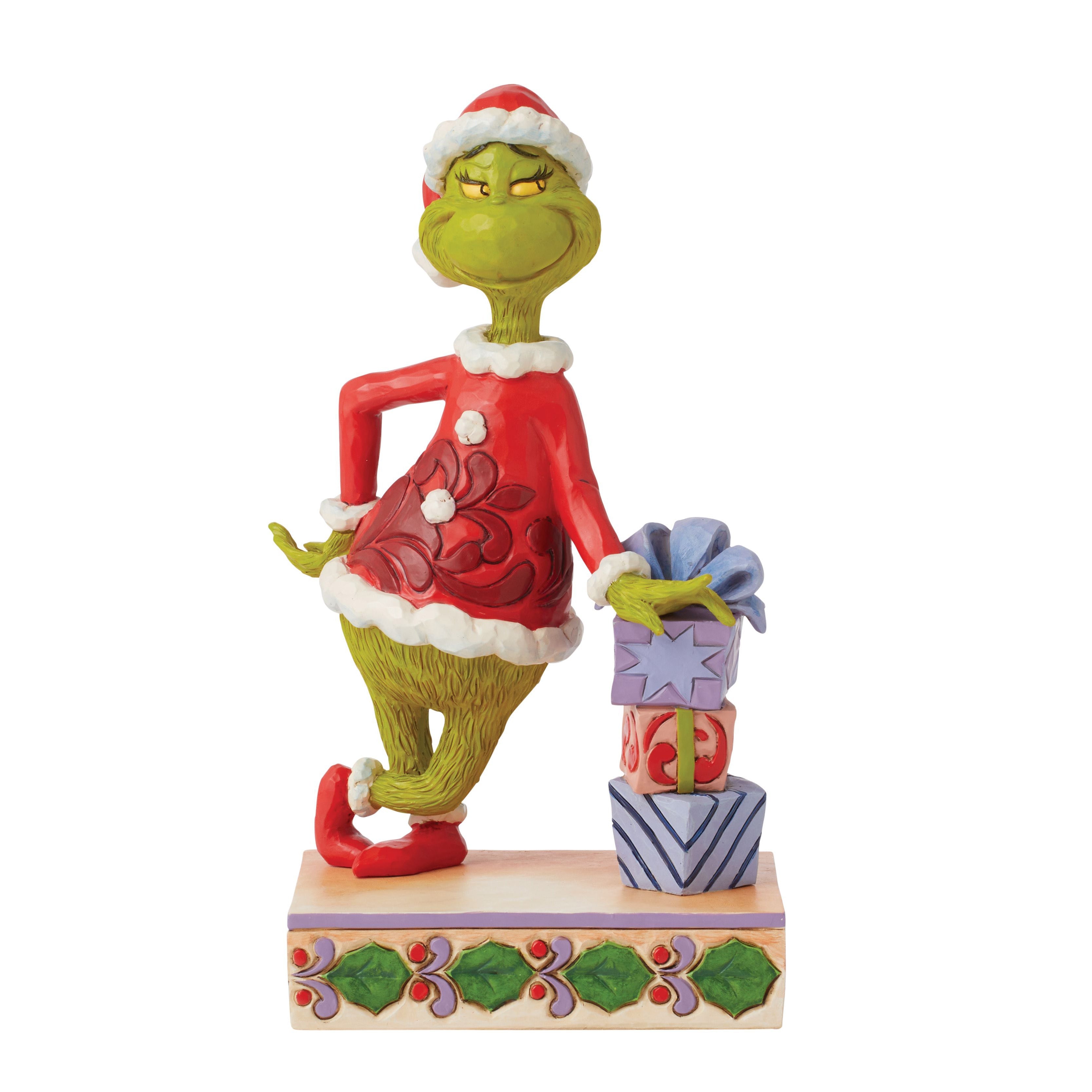Grinch Leaning on Stack of Gifts