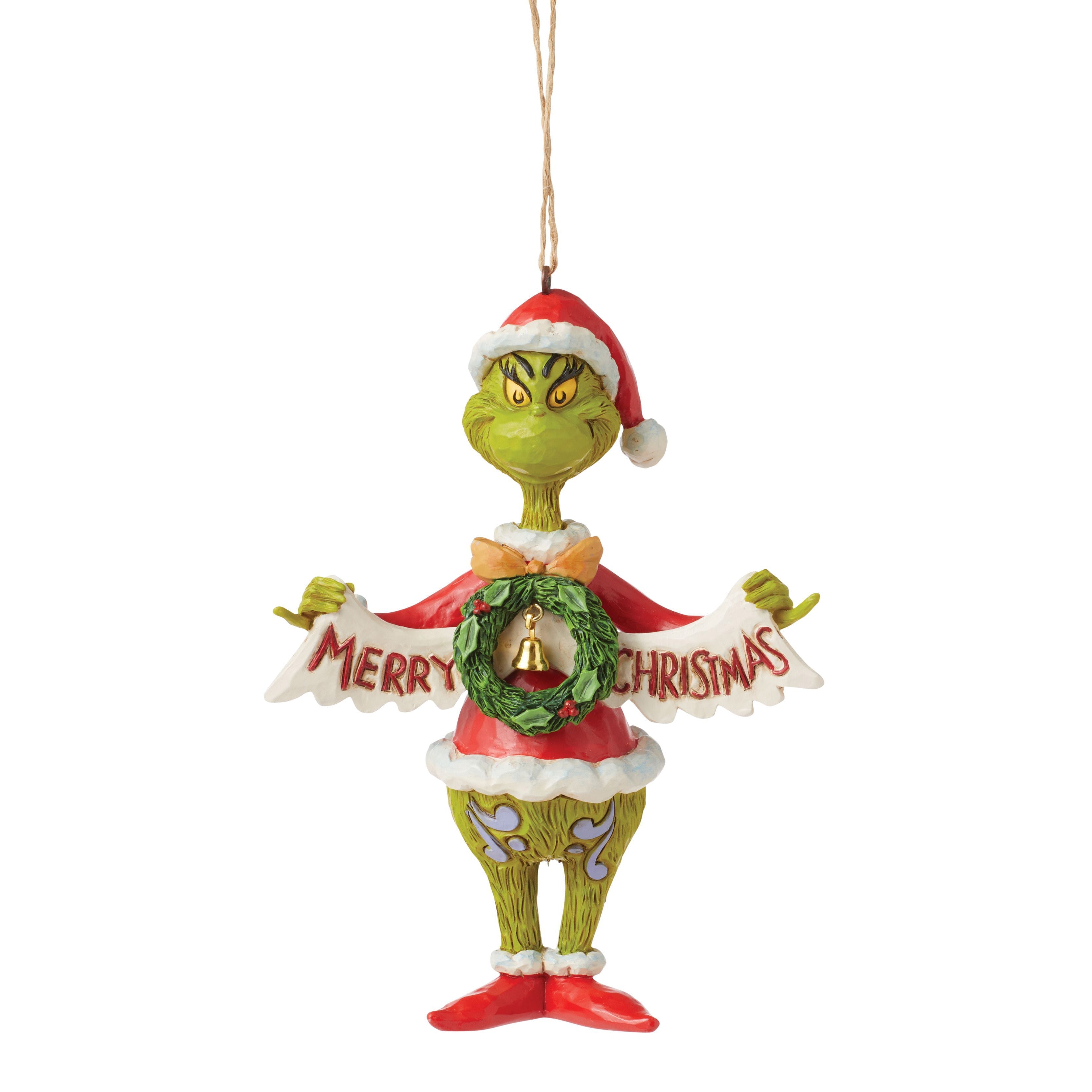 Grinch Holding Merry Christmas Banner